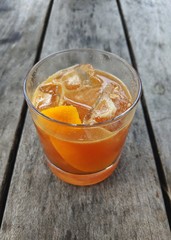 Rum Old Fashioned on Wood Table