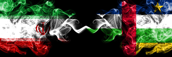 Iran vs Central African Republic smoky mystic states flags placed side by side. Thick colored silky smokes flag combination of Iranian and Central African Republic