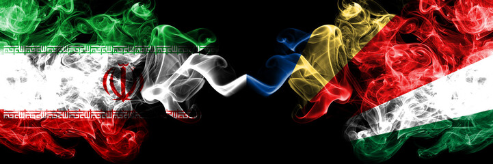 Iran vs Seychelles, Seychelloise smoky mystic states flags placed side by side. Thick colored silky smokes flag combination of Iranian and Seychelles, Seychelloise