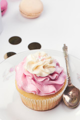 pink cupcake with gold vintage spoon and plate confetti scene party 