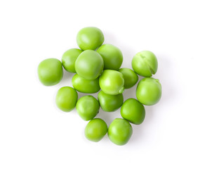 Fresh green peas seeds on a white background, top view