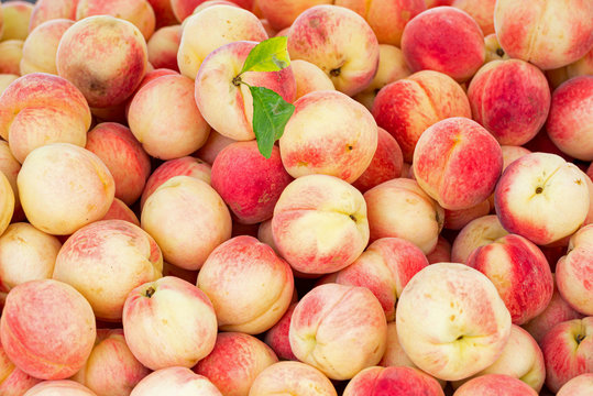 White Peaches At An Outdoor Market