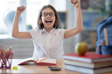 Kid is learning in class