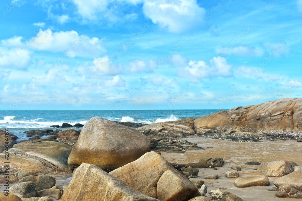 Wall mural the beach on the bright blue sky waves and wind on vacation and travel