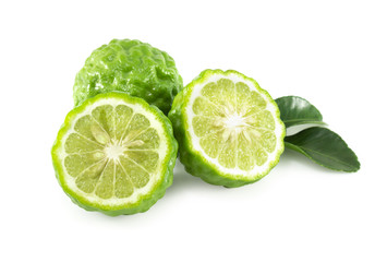 Fresh bergamot fruit slice with green leaf isolated on white background, herb and medical