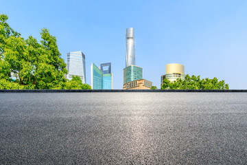 Fototapeta na wymiar Shanghai city buildings and empty asphalt road