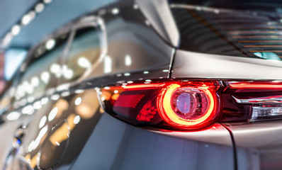 modern car led tail lights in showroom
