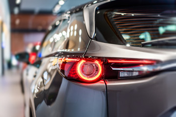 modern car led tail lights in showroom