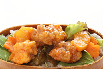 Chinese food, sweet and sour pork on rice for lunch box image