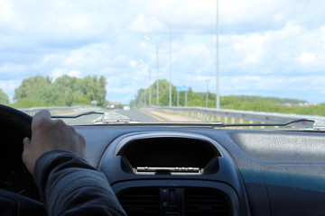 view from the passenger compartment on the highway