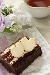 Heart shaped cookie on dish for Valentine sweet food image