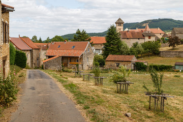 Fototapeta na wymiar Street of medieval Blanot village, Saone-et-Loire, France