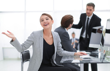 successful young woman in the workplace in the office