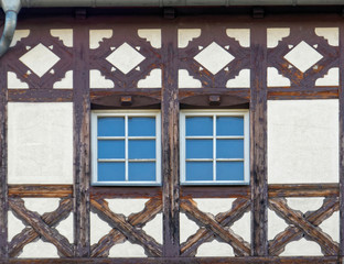 Germany, two windows of traditional  half-timbered house building