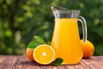 orange juice in glass jug