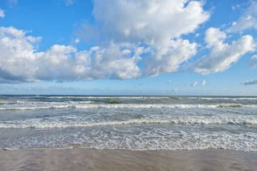 Fototapeta na wymiar Tranquil summer scene of Baltic sea. Beautiful blue sky with cloud.