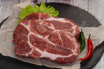 Raw pork neck steak