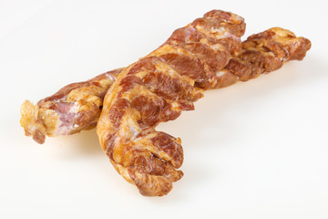 Smoked pork meat over white background