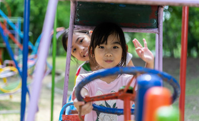 Asian child cute girl Play Playground happy smile