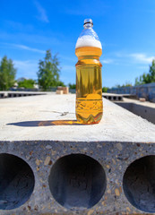 Beer in a bottle at a construction site