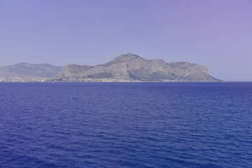 View to the blue  sea from the big ship neart port. Peaceful serene landscape.