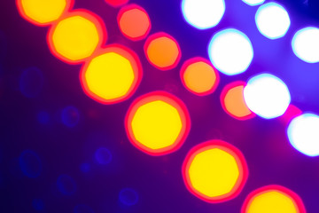 Abstract Blue red bokeh lights and reflections. Festive background of 80s colors
