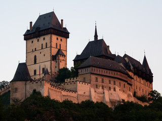 Fototapeta na wymiar Gothic Karlstejn Castle at Sunset in Bohemia Czech Republic, a Medieval Fortress buildt by Charles IV ind Central Europe