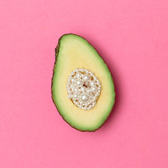 Creative Avocado. Minimal flat lay art. Vegan fashion concept