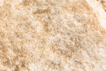 Fototapeta premium The texture of granite beige, background, close-up. Space for text.