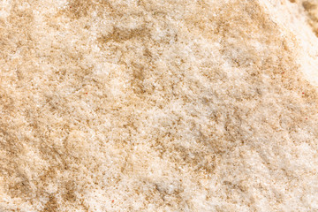 The texture of granite beige, background, close-up. Space for text.