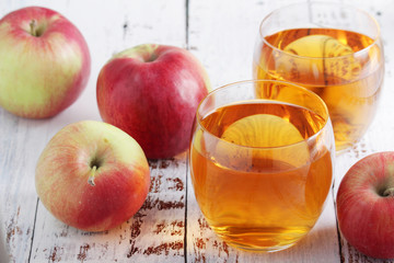 Two glasses with apple juice