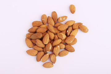 Pile of almond at white background