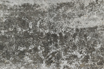 Grunge concrete wall with crack and stains in industrial building. Cement texture for design and background.