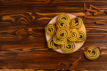 Home made baked cookies with raisins and poppy seeds. Space for text or design.