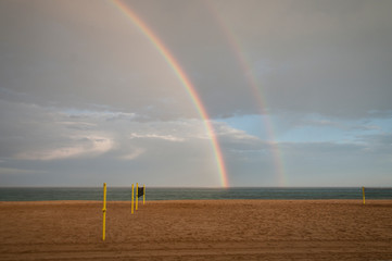 double rainbow on the beach