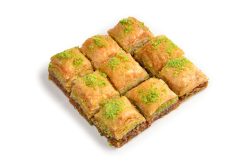 Pistachio baklava on a white background. Dessert.