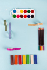 Art objects and scotch for handicrafts, frame with a place for the text on a blue background