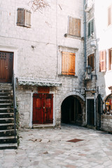  Cozy corners of Montenegro. Panorama of the city of Kotor and the details of the streets.
