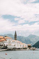 Streets and sights of the old town. Panorama of the city of Perast in Montenegro.