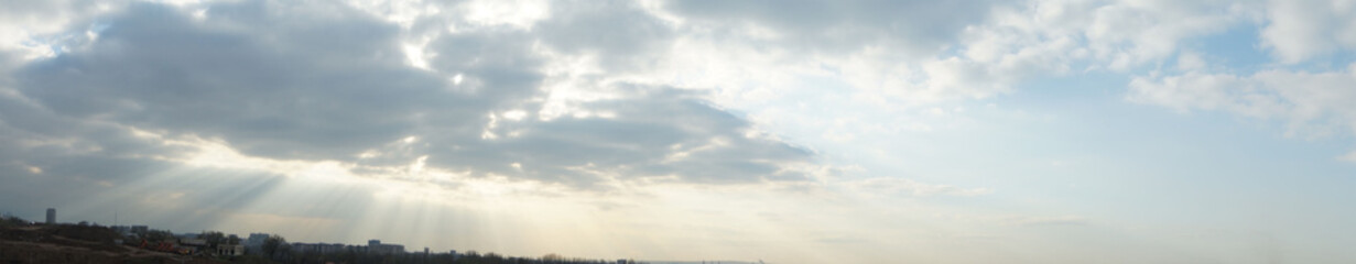 Fototapeta premium Sunset / sunrise with clouds, light rays and other atmospheric effect
