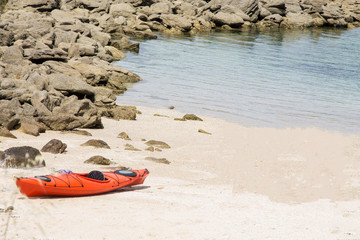 kayak on the shore of the beach