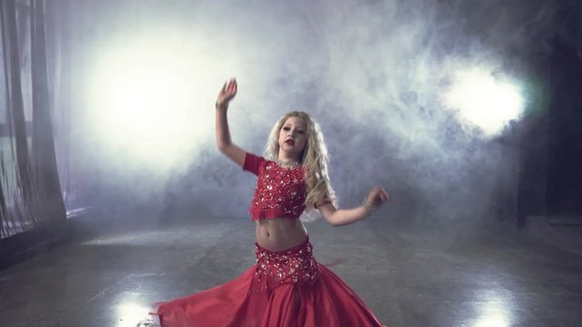 Beautiful girl dancing Turkish belly dance