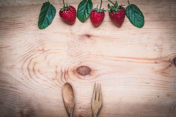 Top view berry fruit and cranola grains, On a wooden table, Vegetarian or Healthy food concept.