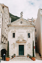 Streets and sights of the old town. Panorama of the city of Perast in Montenegro.