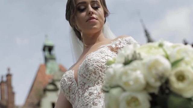 Closeup of bride hold bouquet in her hands