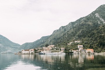 Fototapeta na wymiar Attractions and the coastal town of Kotor. Panorama of the Gulf in Montenegro, Kindness.