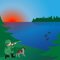 Fototapeta na wymiar hunting with a dog in the early morning on the lake