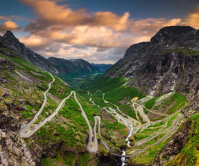 Trollstigen or Trolls Path is a serpentine mountain road in Norway