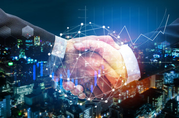 Deal. business man handshake with global network link connection, graph chart of stock market graphic diagram and night city background, digital technology, internet communication, partnership concept