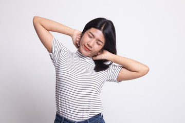 Sleepy young Asian woman yawn.